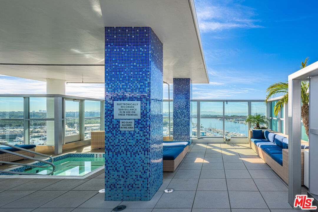 13700 Marina Pointe Drive, Unit 1007 Marina del Rey, CA 90292 - Photo 35 of 53 a lobby with furniture and floor to ceiling window