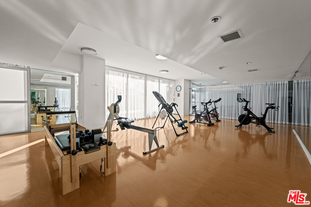 13700 Marina Pointe Drive, Unit 1007 Marina del Rey, CA 90292 - Photo 41 of 53 a view of a room with gym equipment