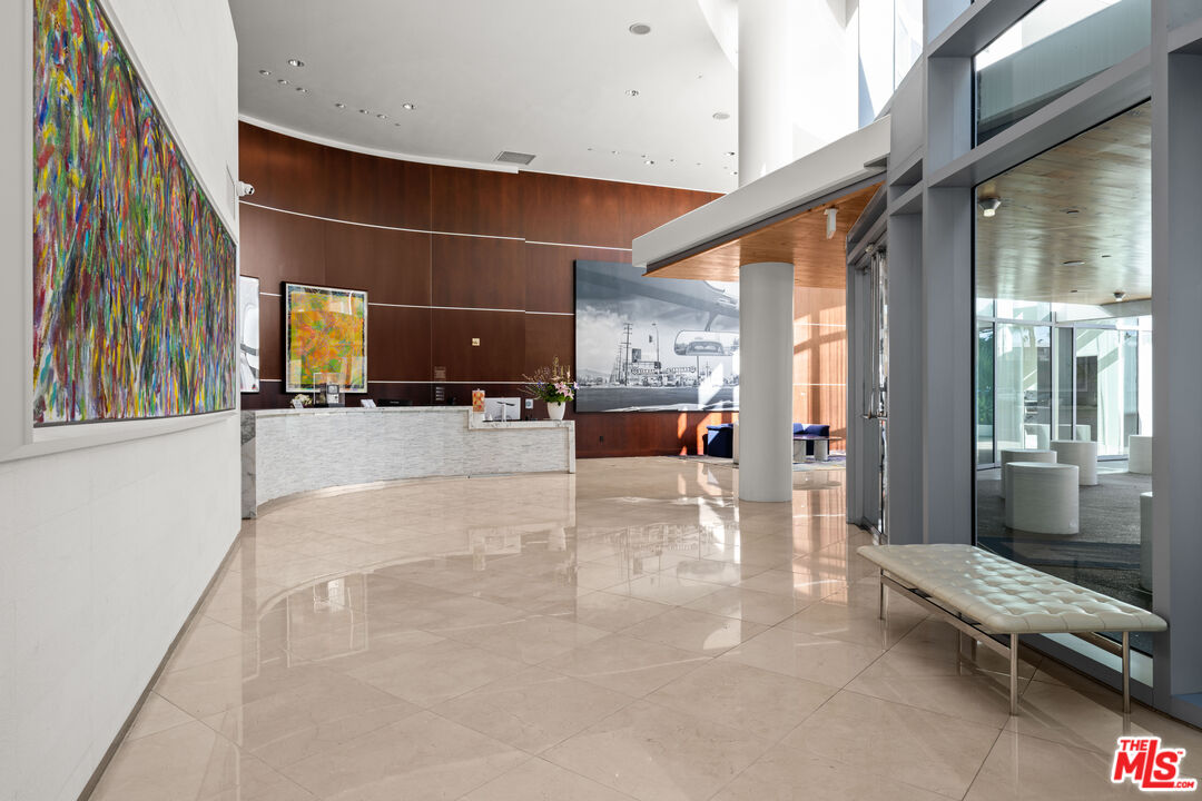 13700 Marina Pointe Drive, Unit 1007 Marina del Rey, CA 90292 - Photo 45 of 53 a lobby with furniture and large windows