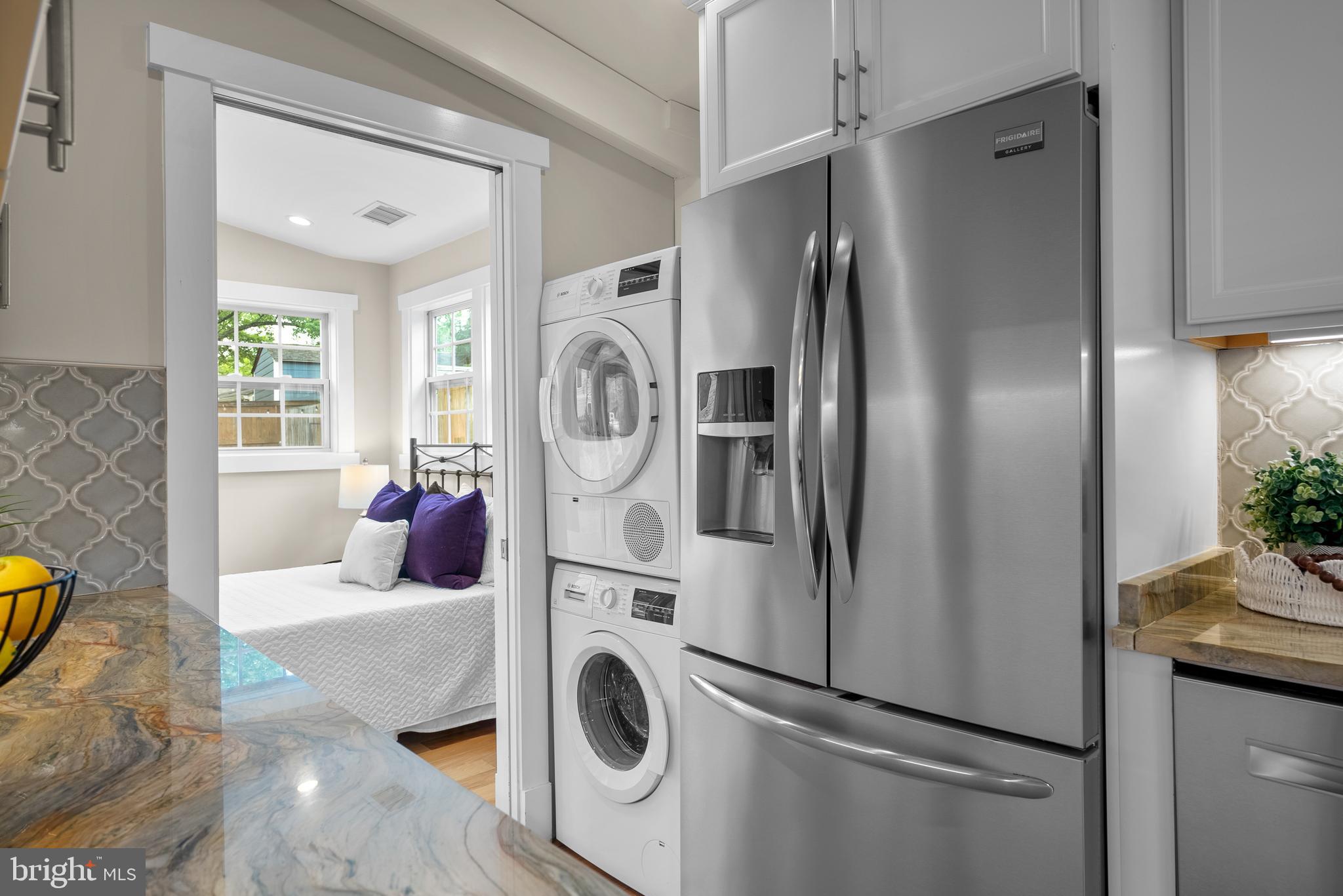 5 Webb Road Cabin John, MD 20818 - Photo 16 of 46 a room with refrigerator and washer