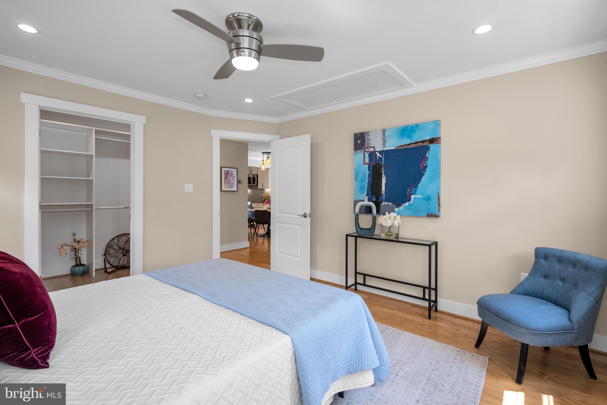 5 Webb Road Cabin John, MD 20818 - Photo 18 of 46 a bedroom with a bed and a chair