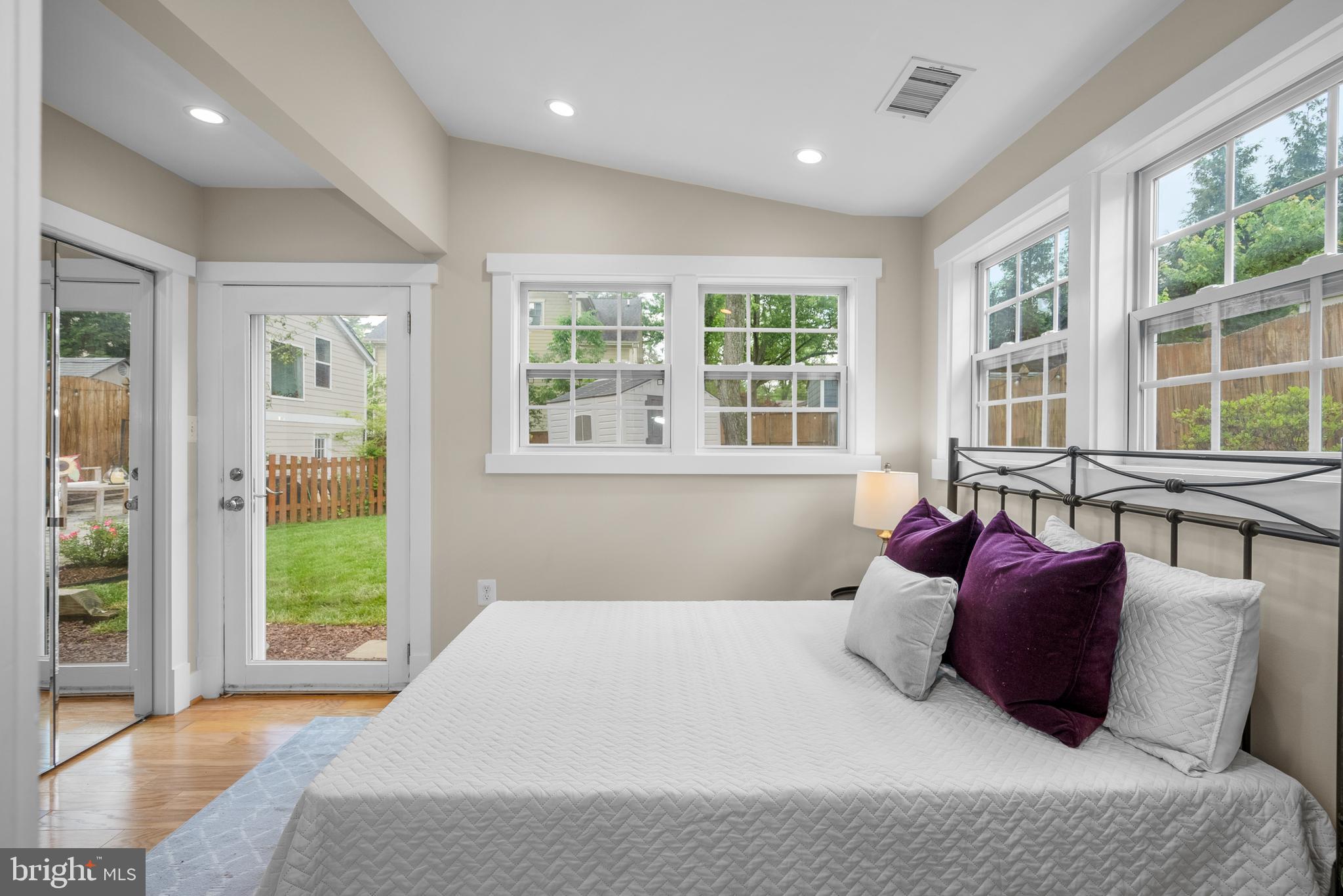 5 Webb Road Cabin John, MD 20818 - Photo 21 of 46 a bedroom with a bed and glass window