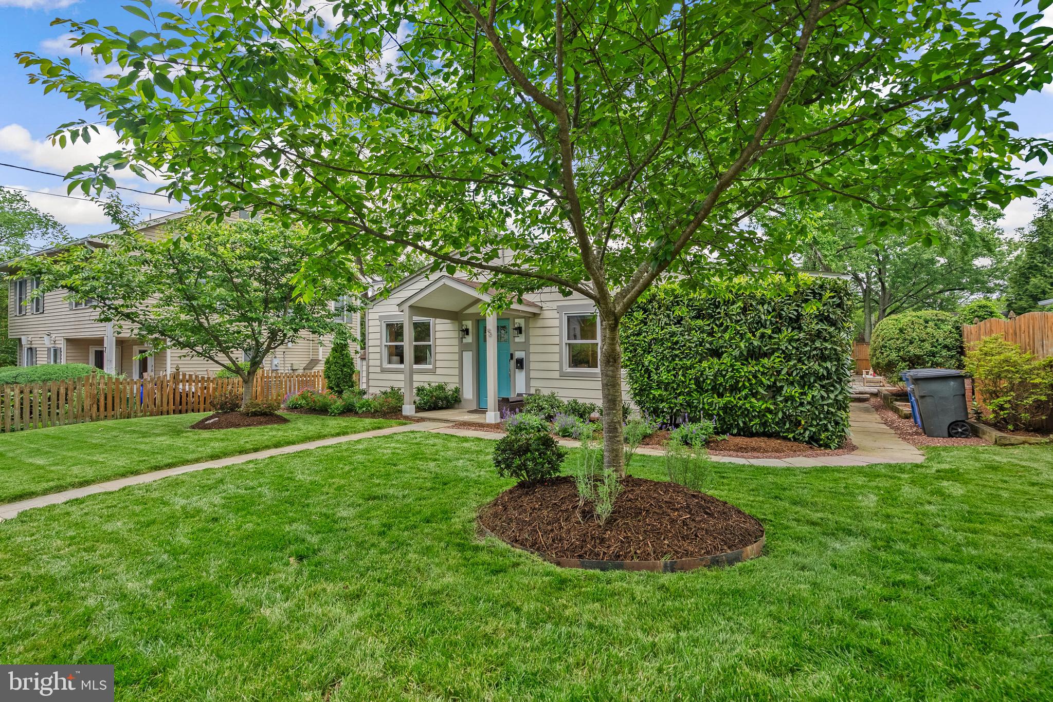 5 Webb Road Cabin John, MD 20818 - Photo 26 of 46 a front view of a house with a yard