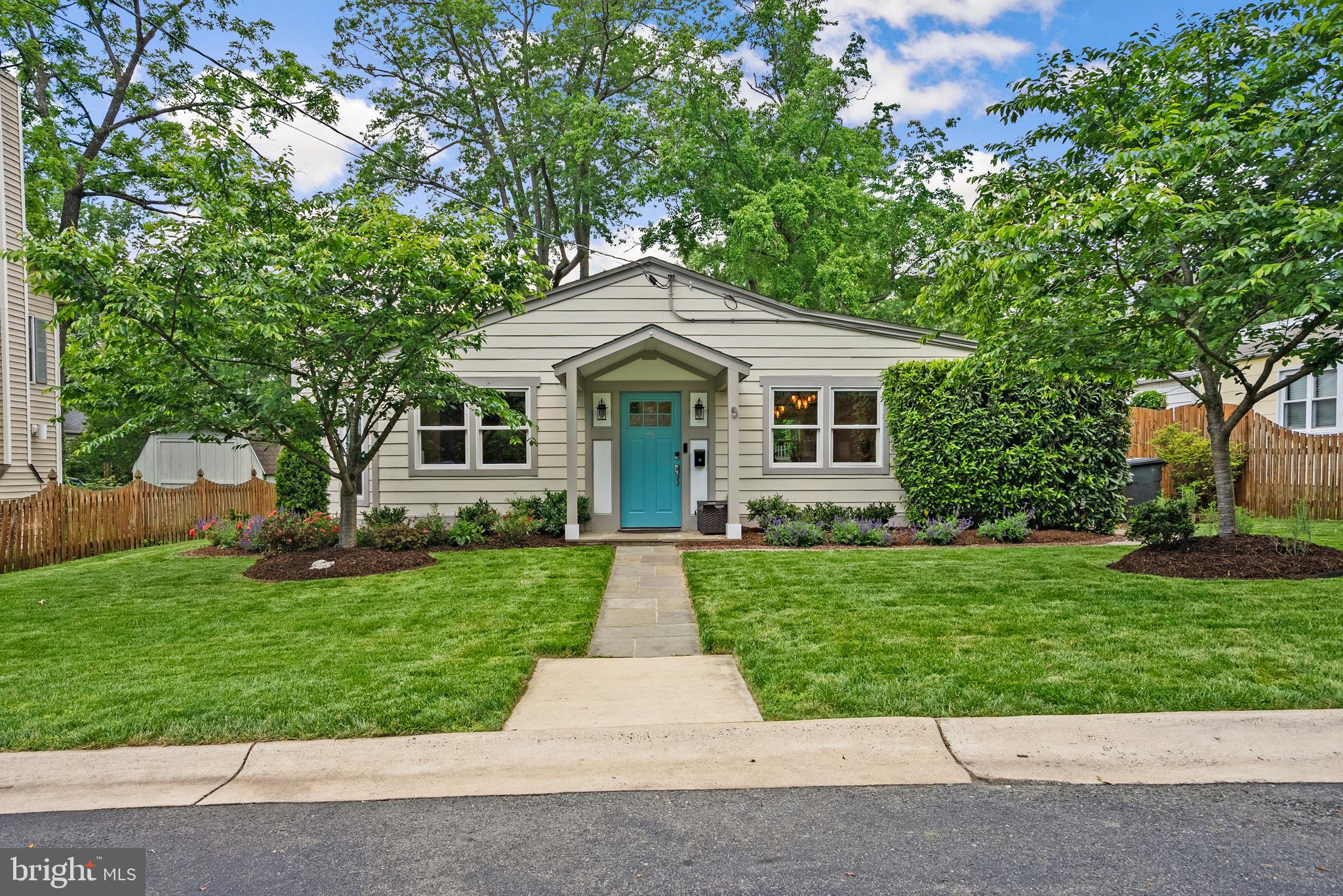 5 Webb Road Cabin John, MD 20818 - Photo 27 of 46 front view of a house with a yard