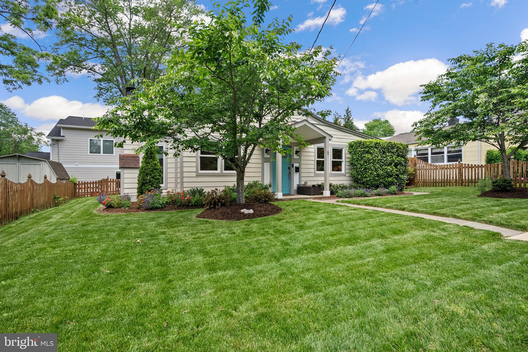 5 Webb Road Cabin John, MD 20818 - Photo 28 of 46 a front view of house with yard and green space