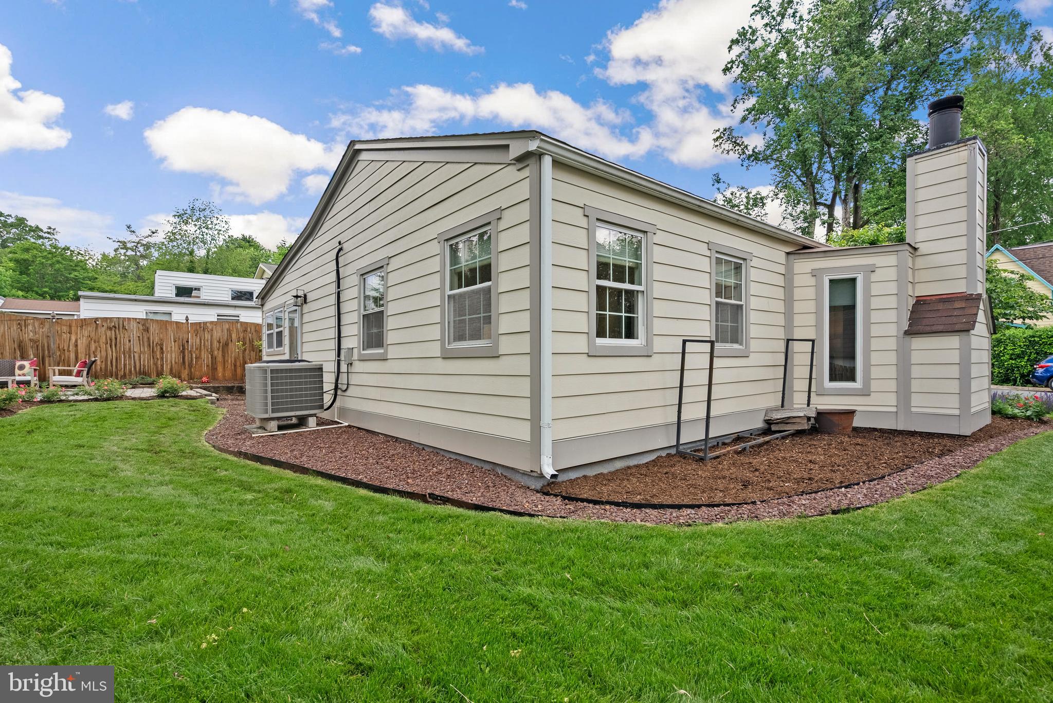 5 Webb Road Cabin John, MD 20818 - Photo 30 of 46 a view of a backyard with a garden