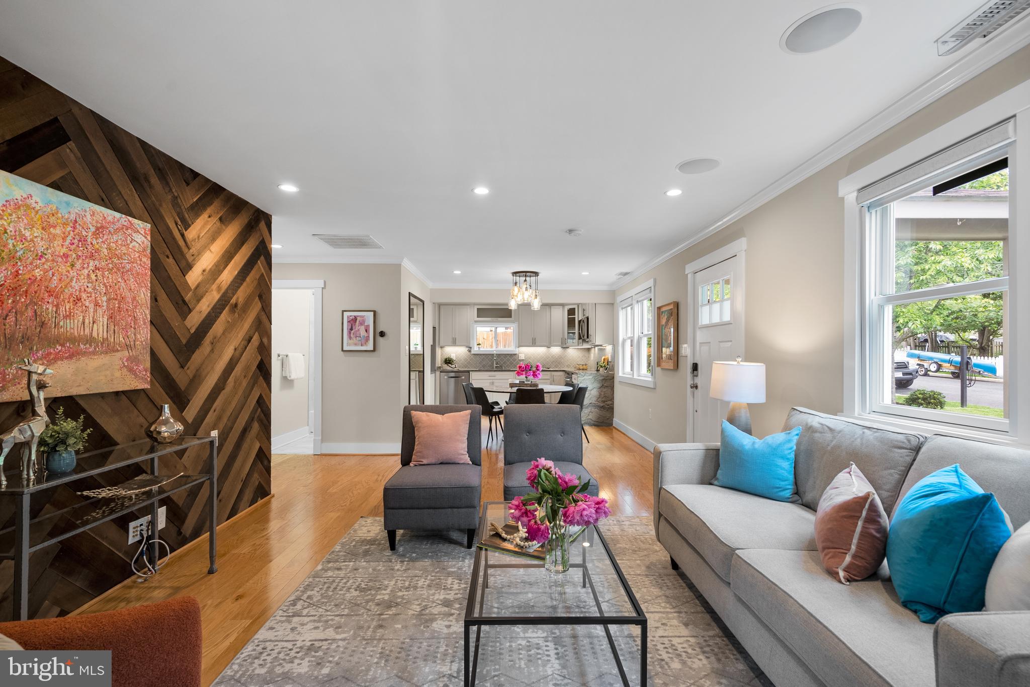 5 Webb Road Cabin John, MD 20818 - Photo 5 of 46 a living room with furniture and a flat screen tv