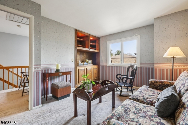 70 River Road, Unit C3 Clifton, NJ 07014 - Photo 22 of 35 a living room with furniture