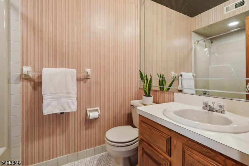 70 River Road, Unit C3 Clifton, NJ 07014 - Photo 23 of 35 a bathroom with a sink and toilet