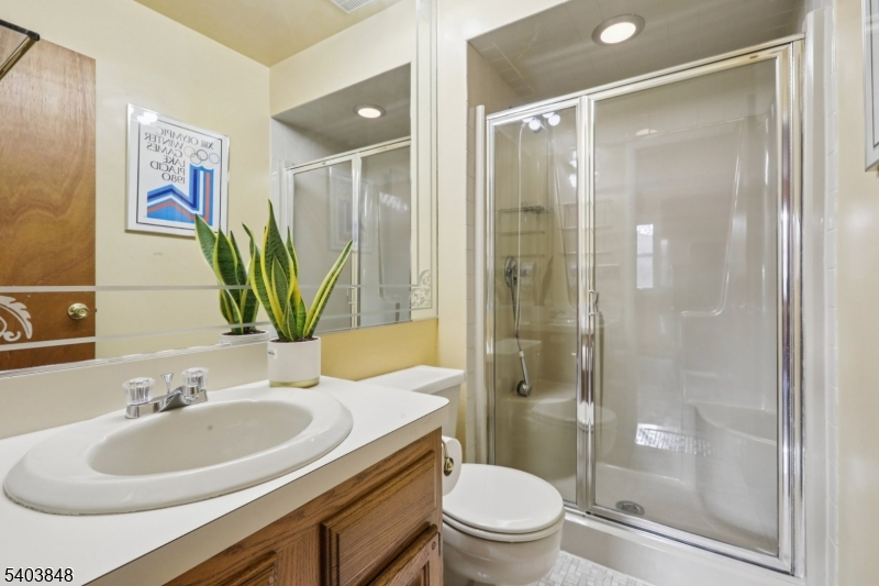 70 River Road, Unit C3 Clifton, NJ 07014 - Photo 29 of 35 a bathroom with a sink toilet and shower