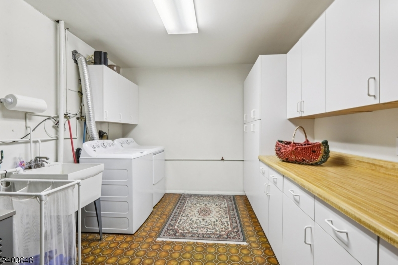 70 River Road, Unit C3 Clifton, NJ 07014 - Photo 31 of 35 a kitchen with a sink and a stove top oven