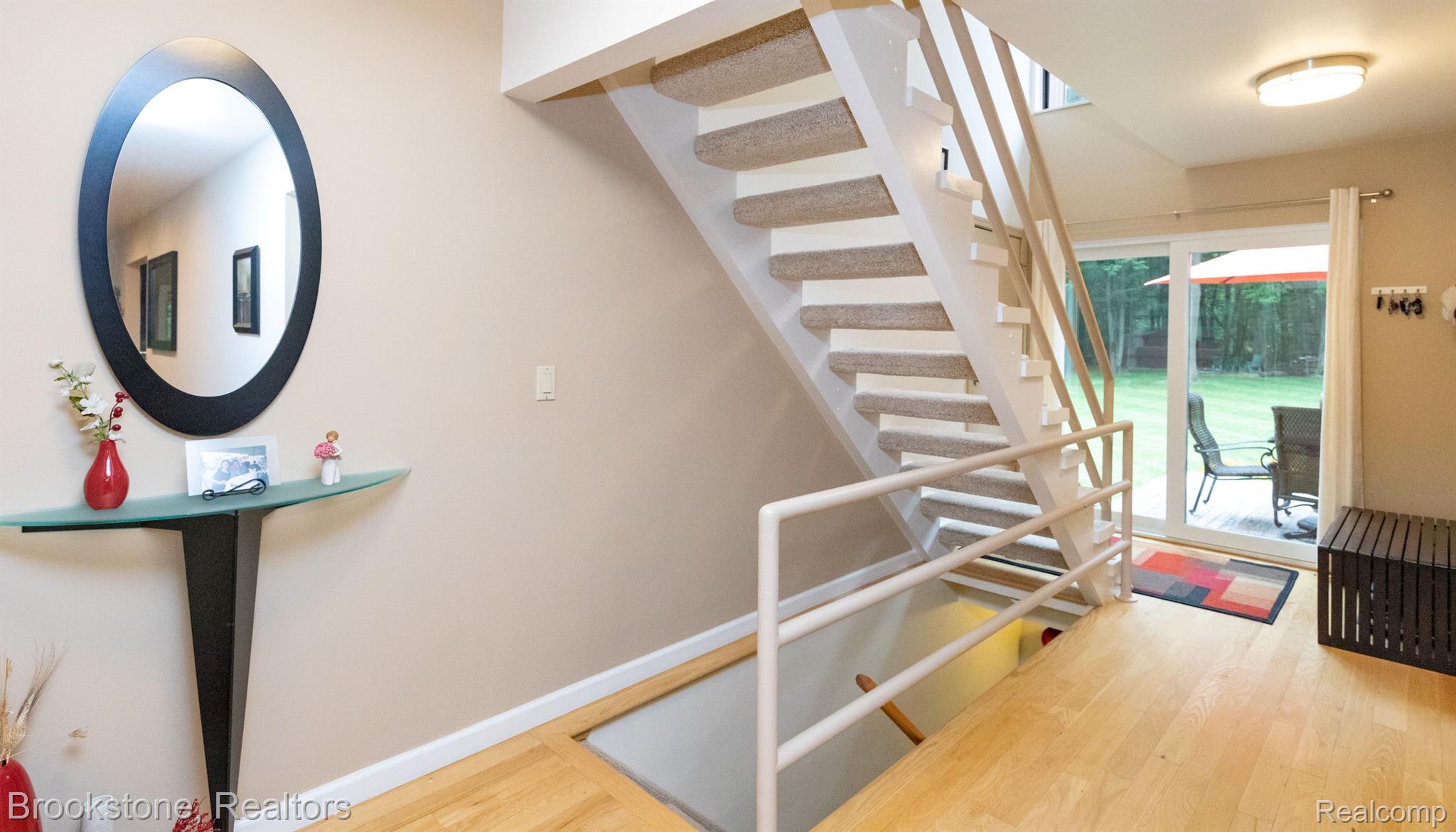 10159 Gibbs Road Clarkston, MI 48348 - Photo 25 of 36 Floating staircase