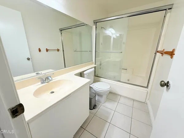 a front view of a house with a ocean view