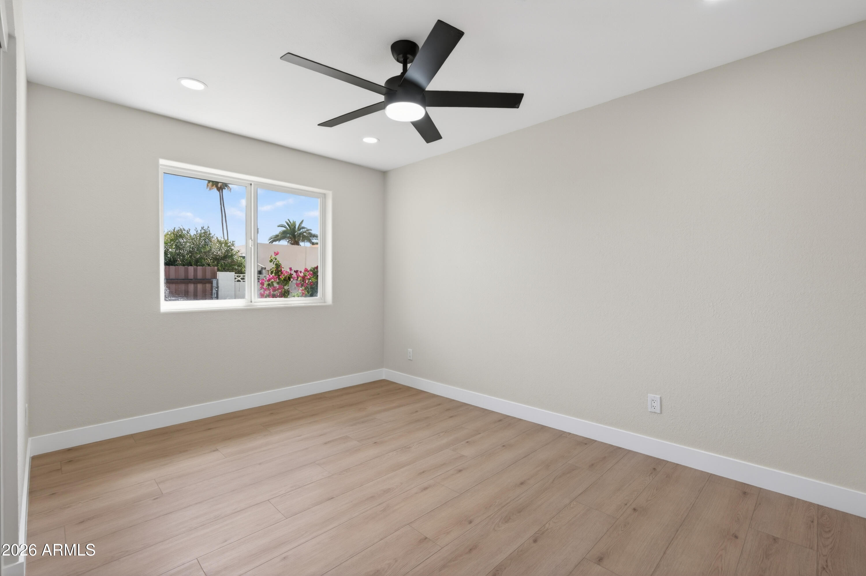 3422 South Terrace Road Tempe, AZ 85282 - Photo 27 of 43 a view of empty room with wooden floor