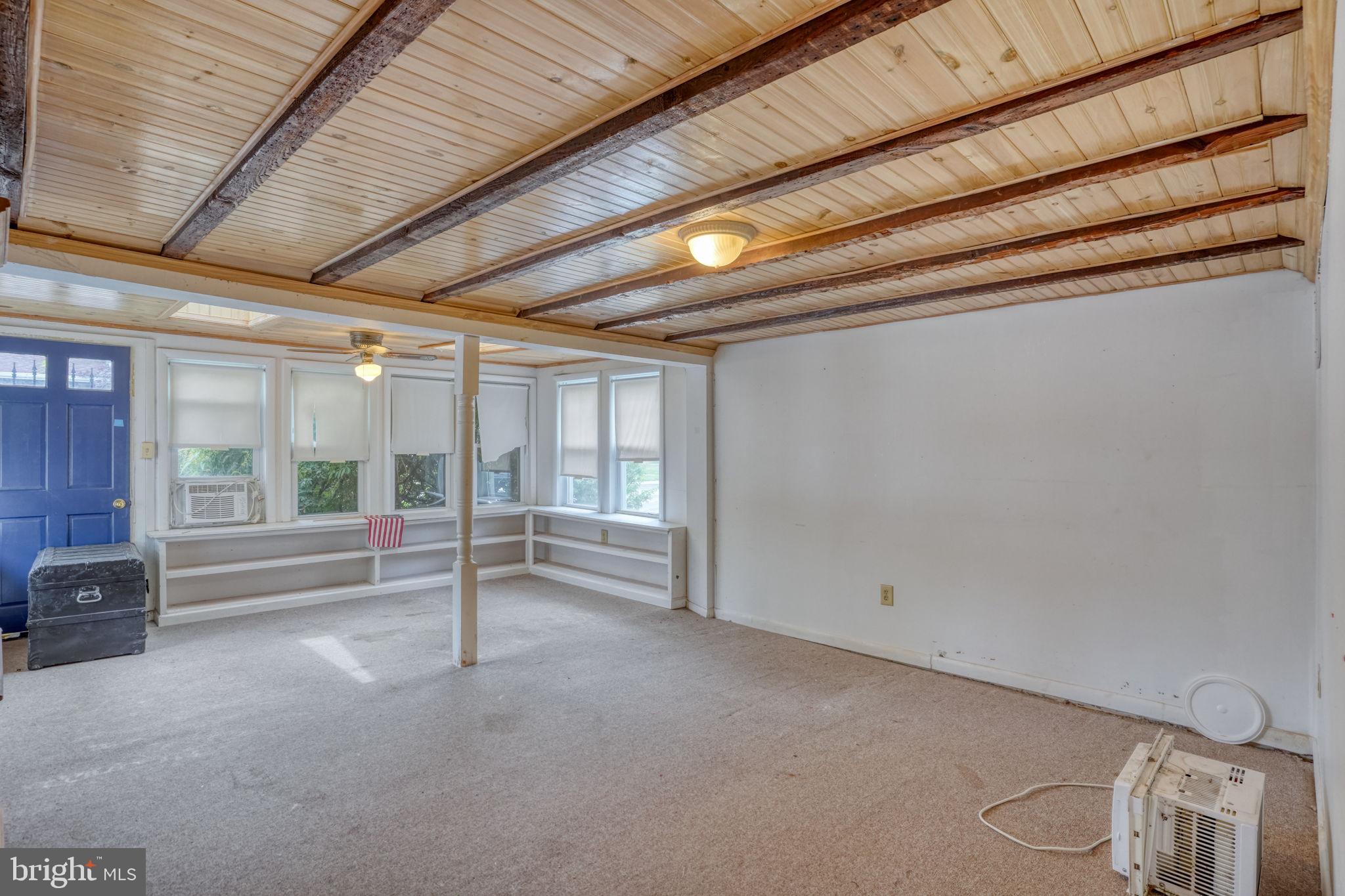 257 Front Street Leipsic, DE 19901 - Photo 6 of 37 a view of an empty room with a window