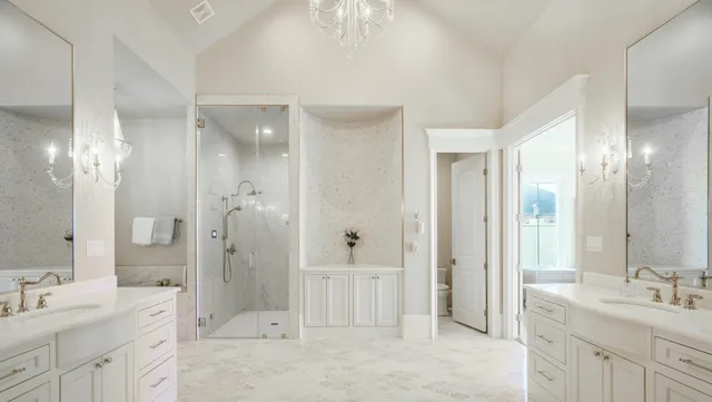a bathroom with a tub and a shower
