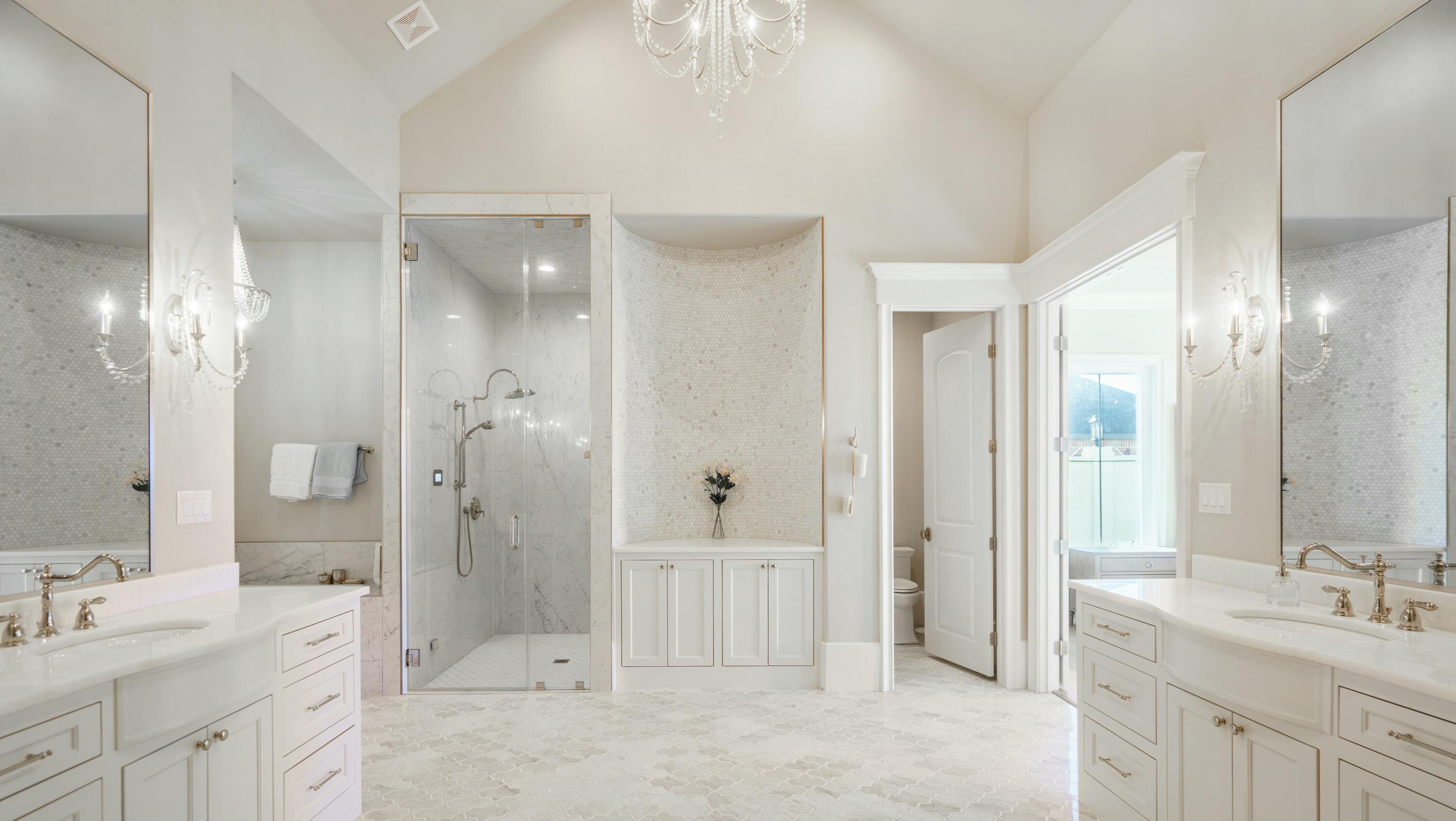 4011 140th Street Lubbock, TX 79423 - Photo 18 of 52 a bathroom with a double vanity sink mirror double and shower