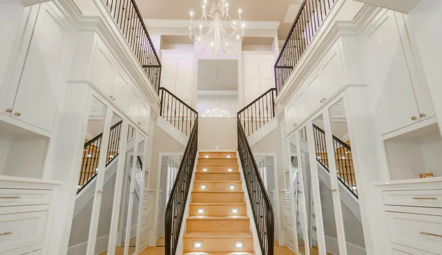 a view of a hallway with staircase