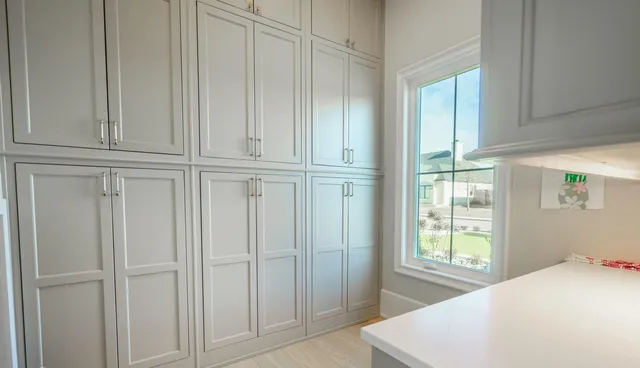 a view of a hallway with white walls