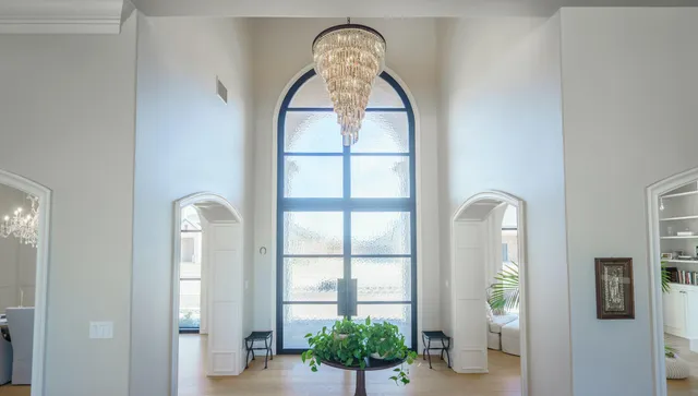 a swimming pool with outdoor seating and yard