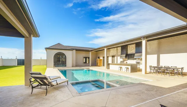 a view of a house with a swimming pool
