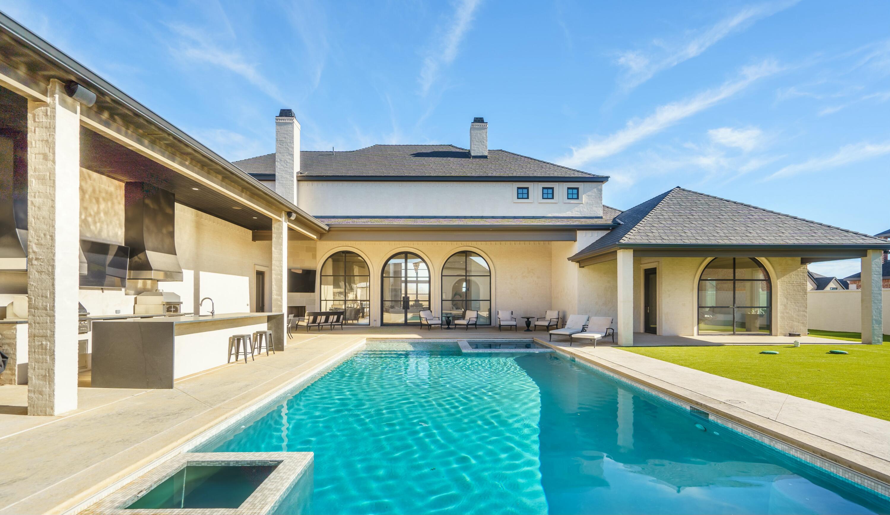 4011 140th Street Lubbock, TX 79423 - Photo 41 of 52 a view of a house with a swimming pool