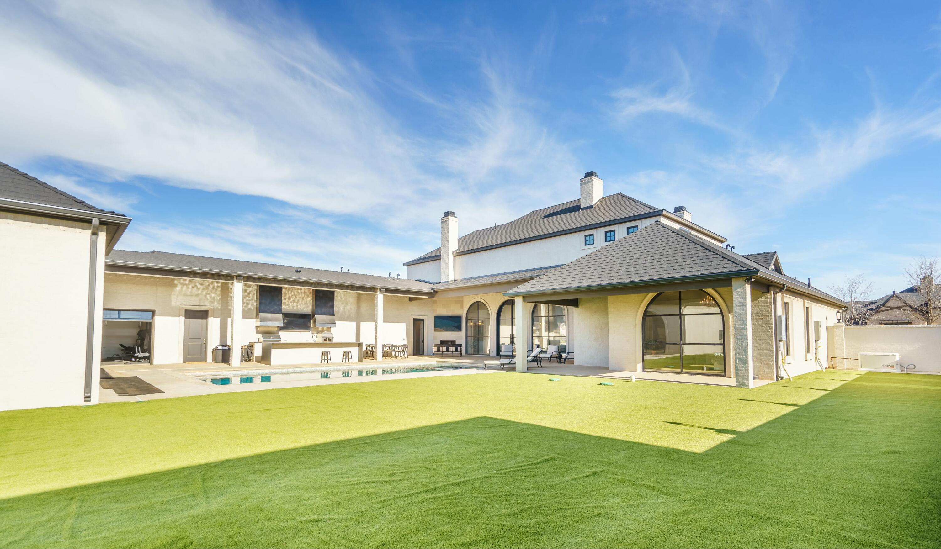 4011 140th Street Lubbock, TX 79423 - Photo 43 of 52 a view of a patio with swimming pool table and chairs
