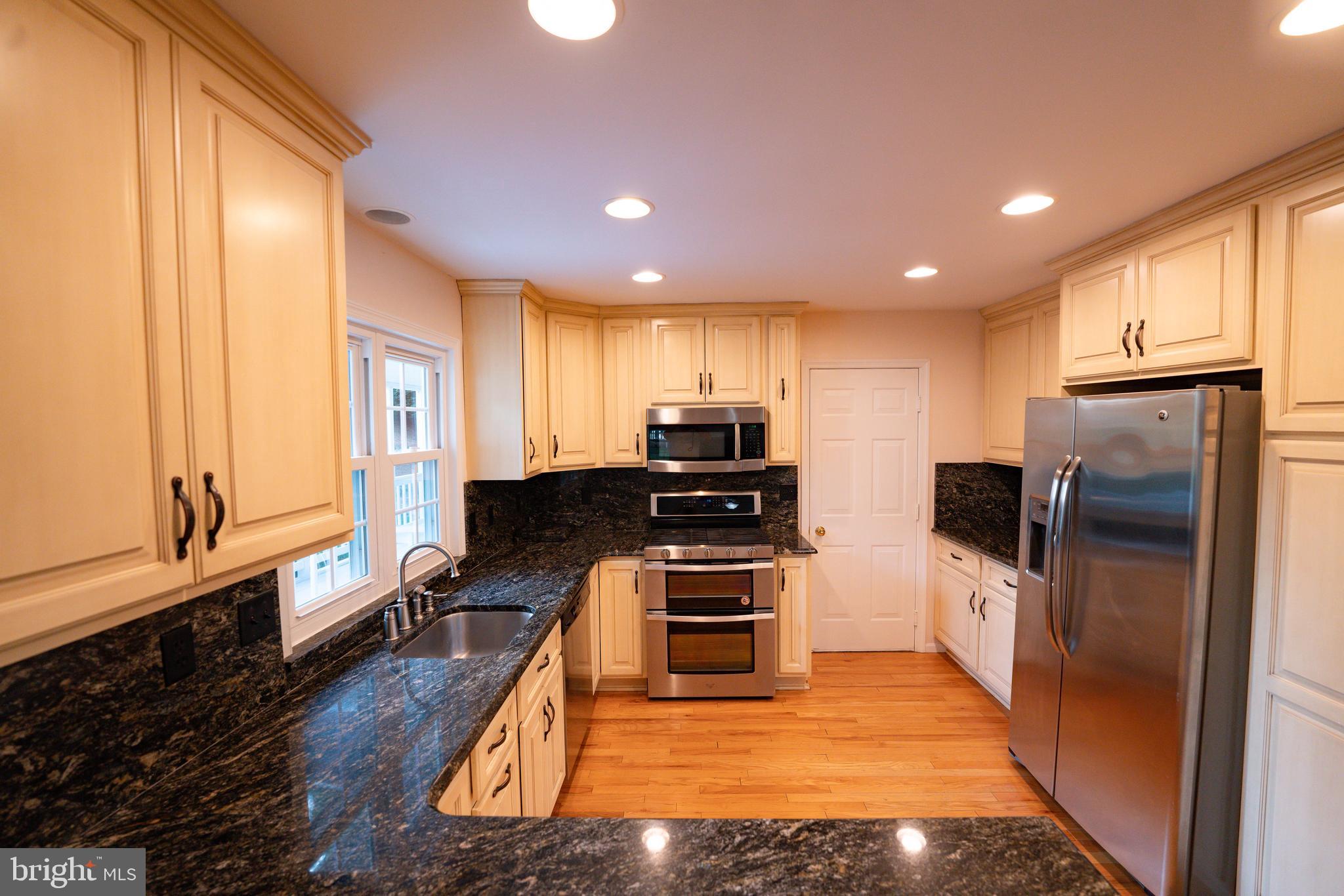 115 Troon Circle Mount Airy, MD 21771 - Photo 8 of 40 stone counters, tall cabinets, sink window