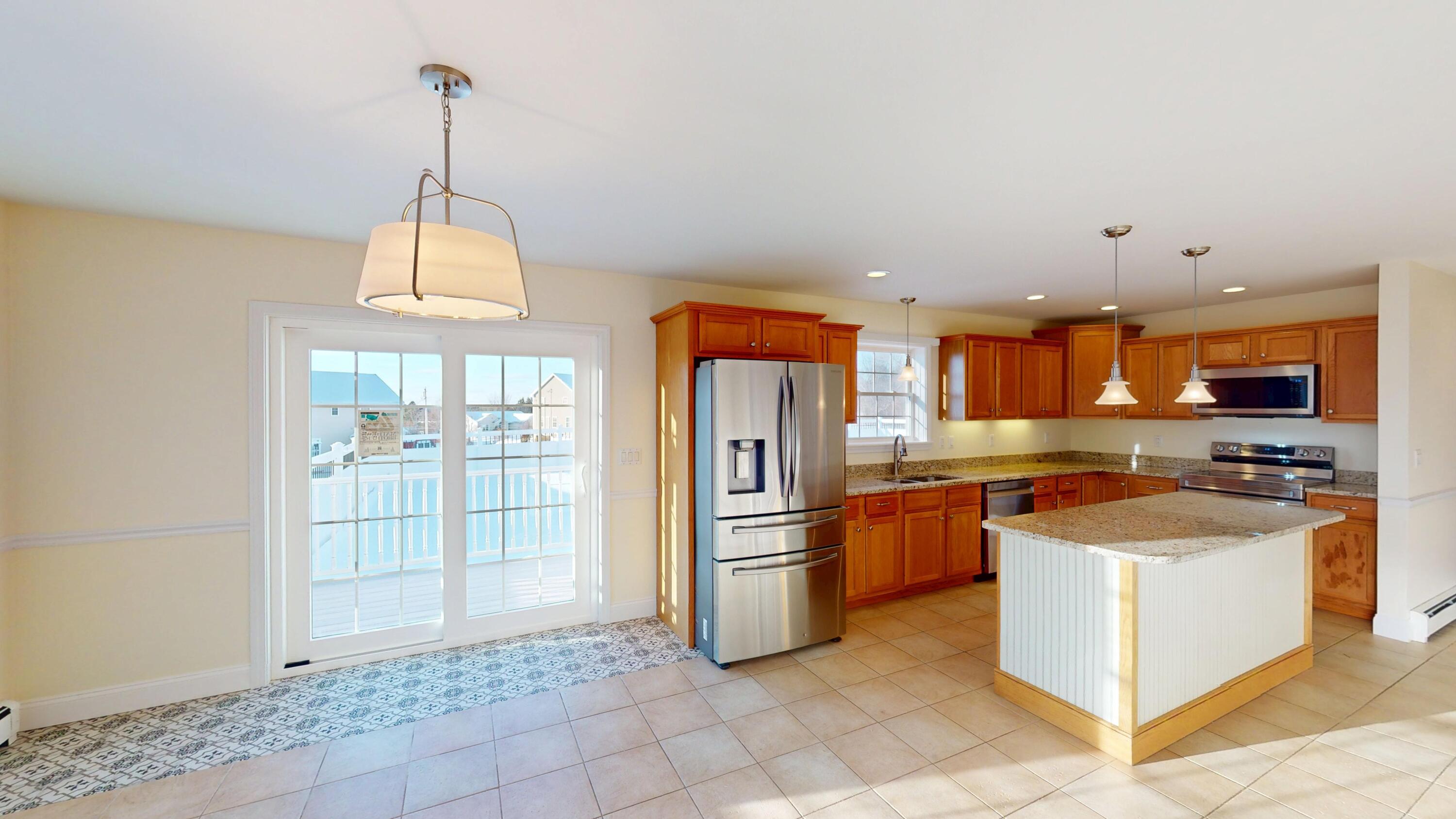 154 Judson Boulevard Bangor, ME 04401 - Photo 20 of 58 154-Judson-Blvd-Kitchen-and-Dining-Area-