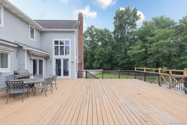 a balcony with seating space