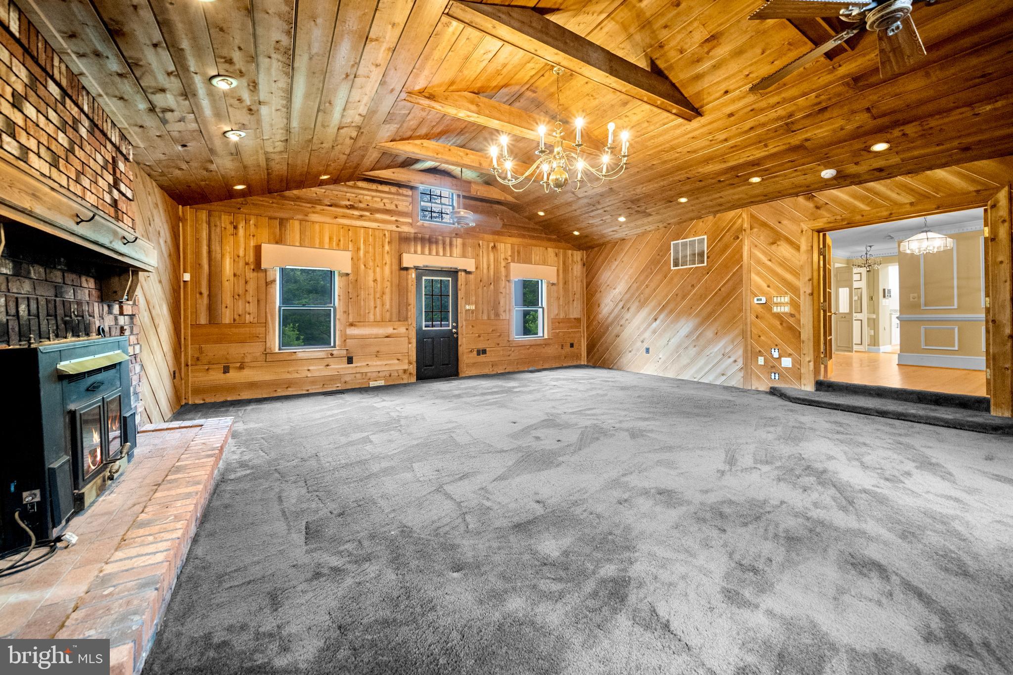 18189 Sands Road Purcellville, VA 20132 - Photo 49 of 145 Grand cedar living room with working fireplace.