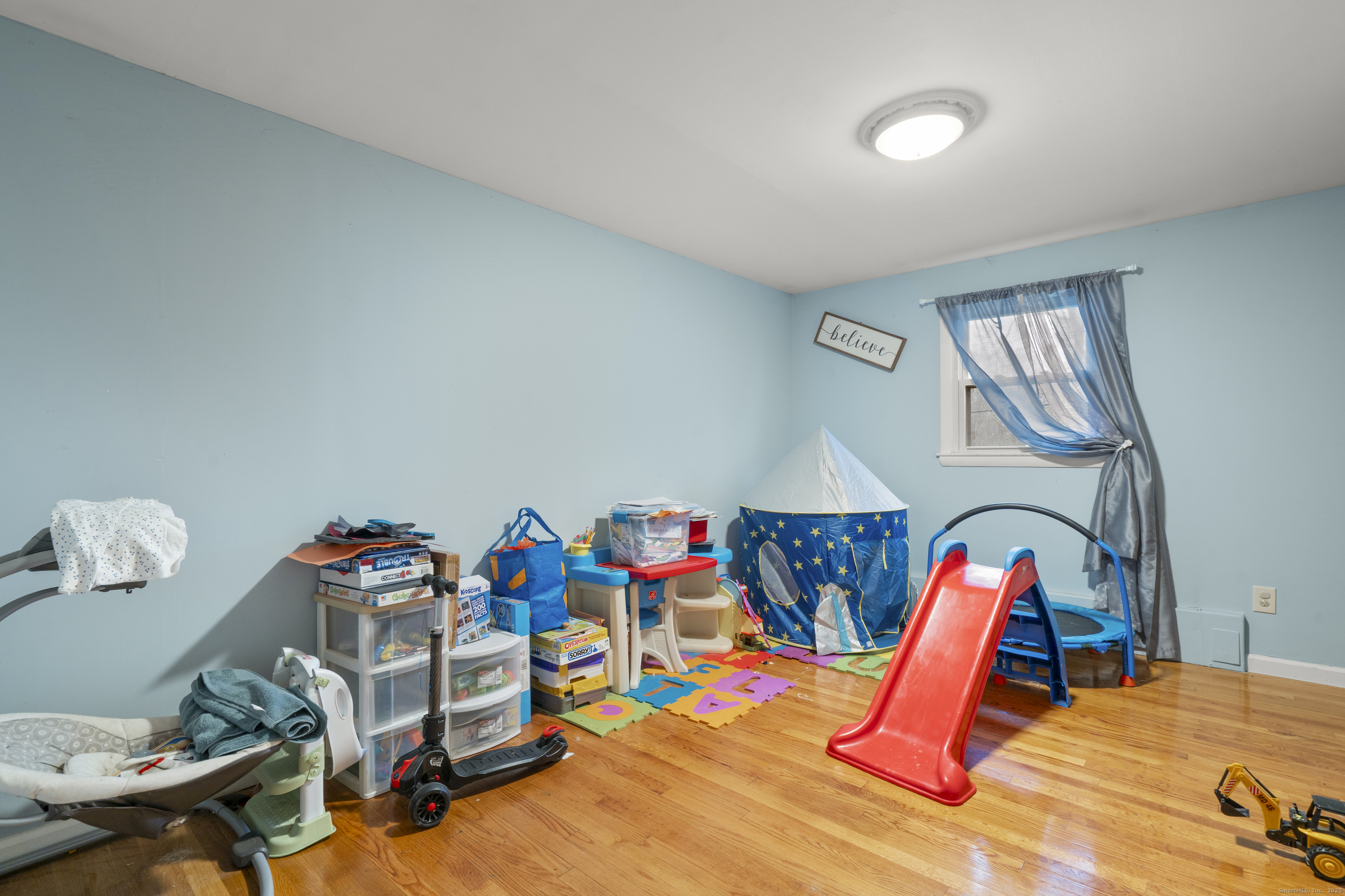 523 Chamberlain Hill Road Haddam, CT 06441 - Photo 15 of 38 a bedroom with a bed workspace and a window