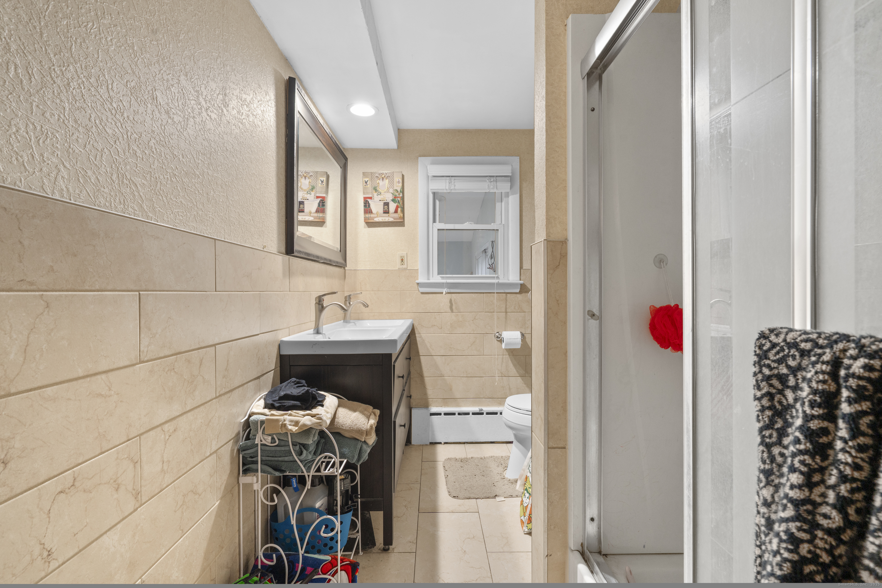 523 Chamberlain Hill Road Haddam, CT 06441 - Photo 17 of 38 a bathroom with a bathtub and shower