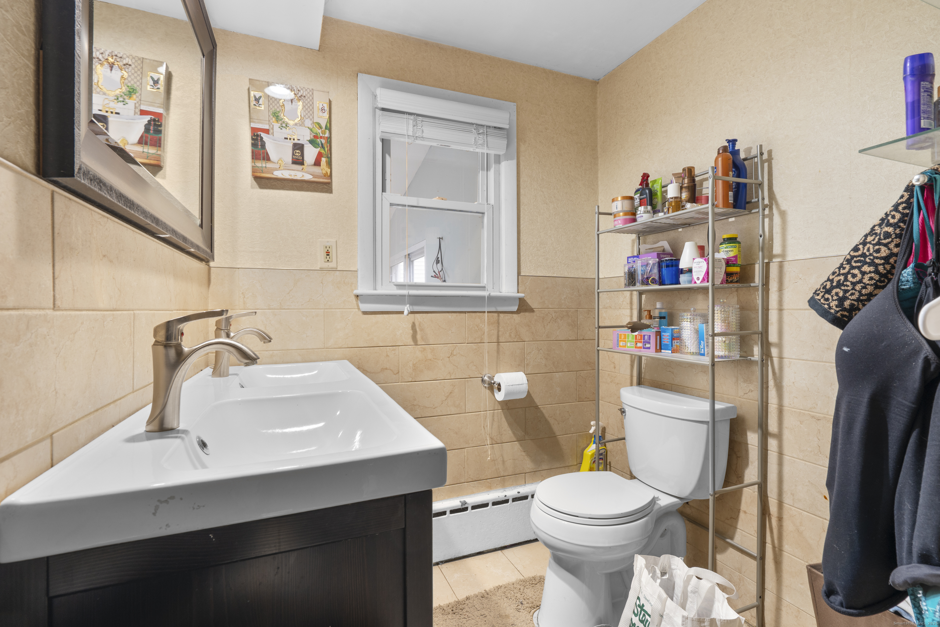 523 Chamberlain Hill Road Haddam, CT 06441 - Photo 18 of 38 a bathroom with a sink toilet and a mirror