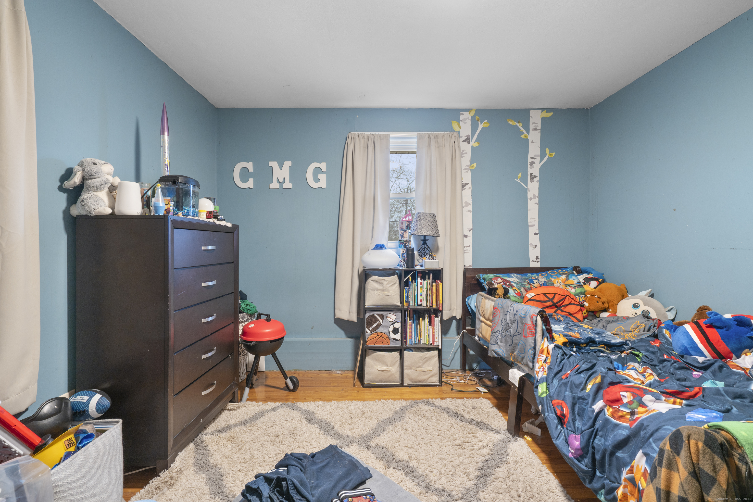 523 Chamberlain Hill Road Haddam, CT 06441 - Photo 21 of 38 a living room with furniture and a couch