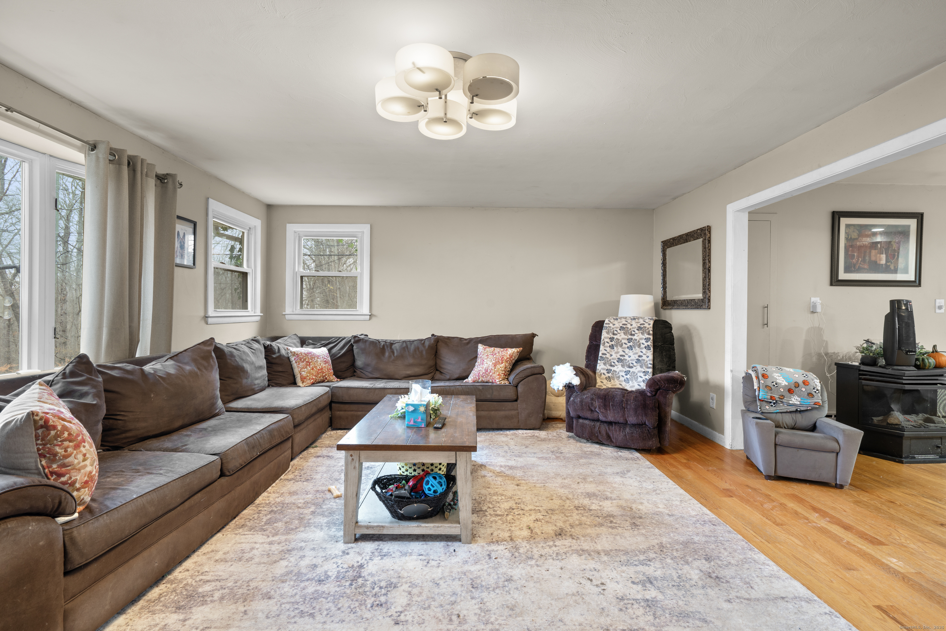 523 Chamberlain Hill Road Haddam, CT 06441 - Photo 4 of 38 a living room with furniture rug and window