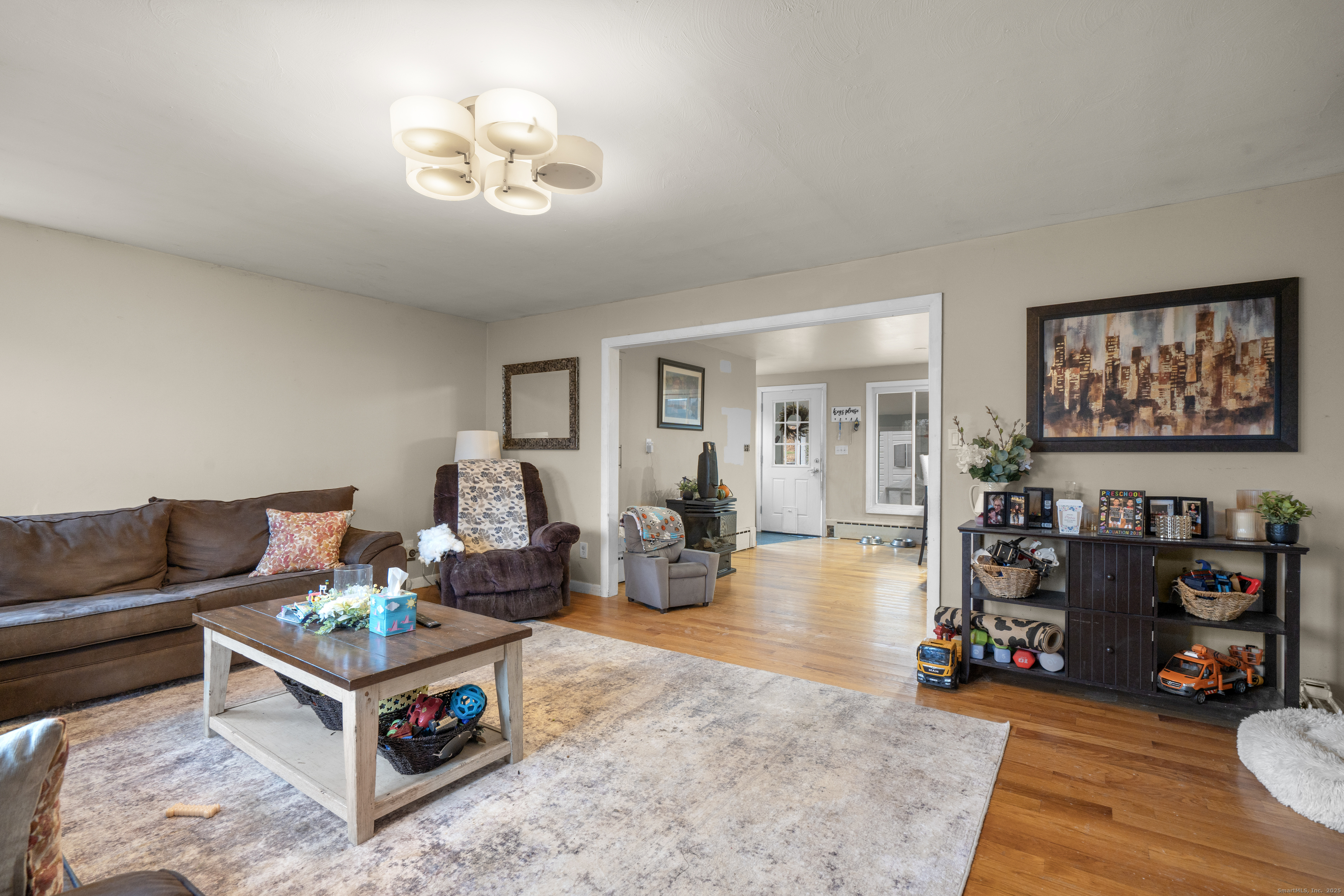 523 Chamberlain Hill Road Haddam, CT 06441 - Photo 5 of 38 a living room with furniture and wooden floor