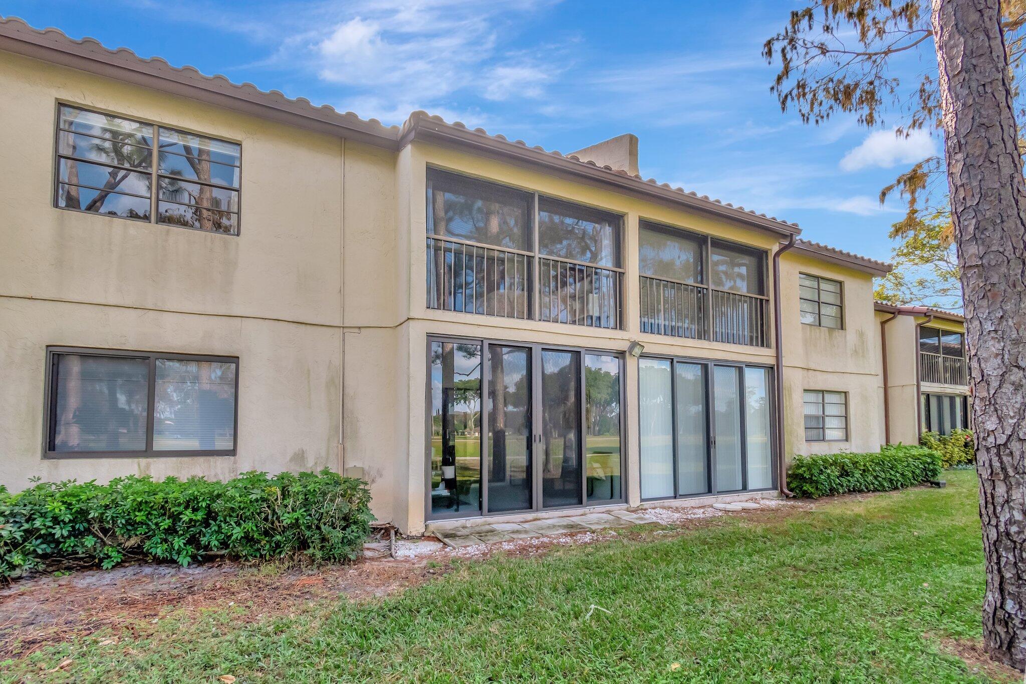 21856 Arriba Real, Unit 5F Boca Raton, FL 33433 - Photo 42 of 61 EXTERIOR BACK