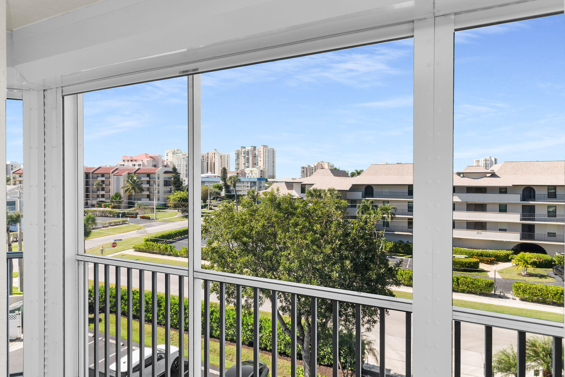 1111 Swallow Avenue, Unit 1401 Marco Island, FL 34145 - Photo 28 of 36 a view of a city from a balcony