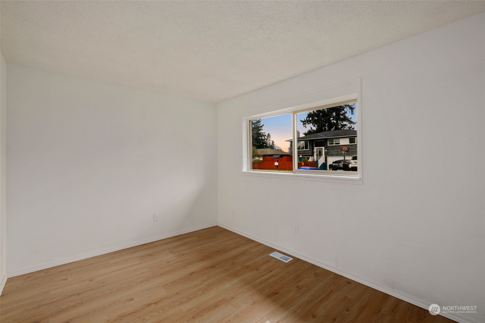 10705 Southeast 236th Place Kent, WA 98031 - Photo 12 of 36 wooden floor in a empty room
