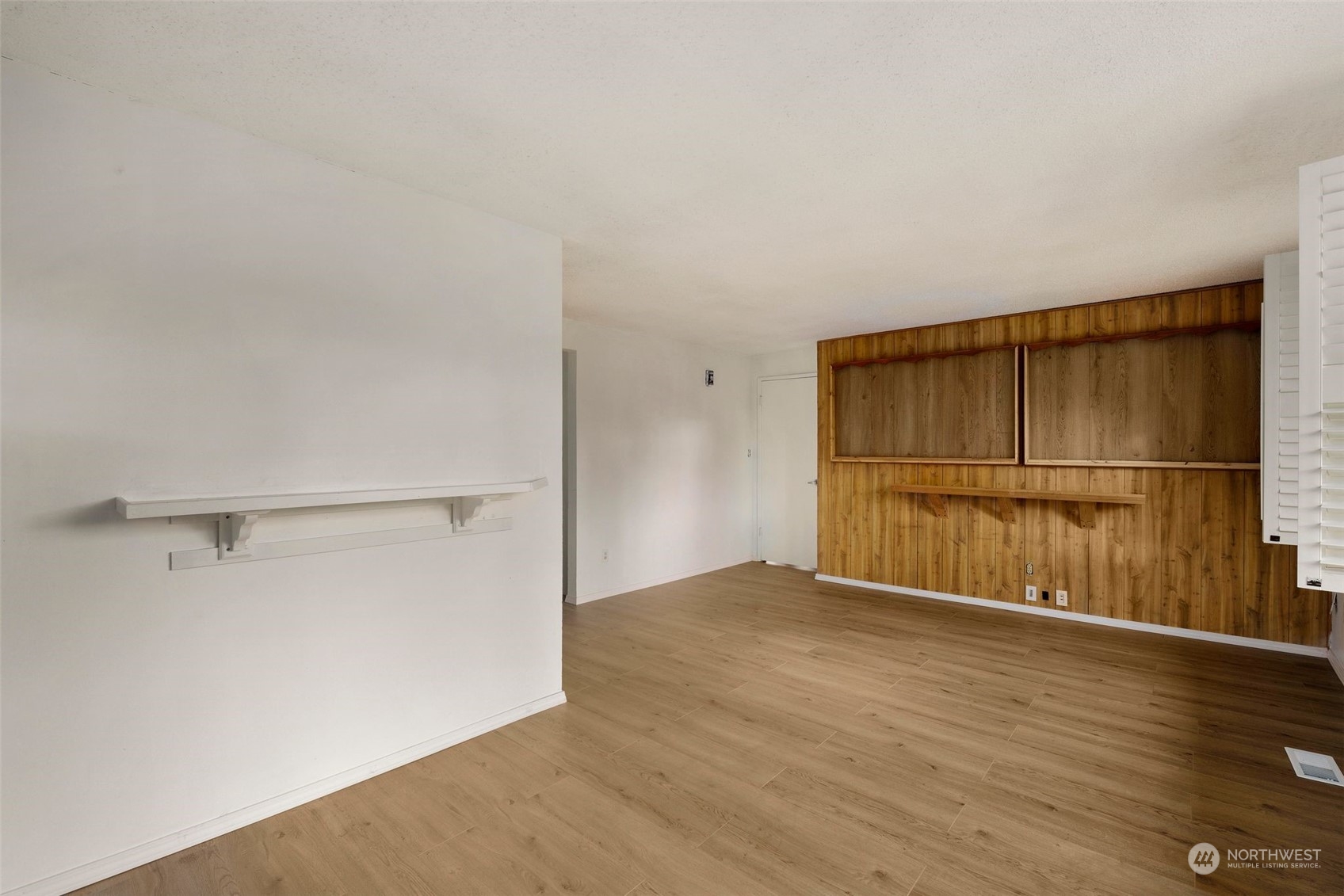 10705 Southeast 236th Place Kent, WA 98031 - Photo 16 of 36 a view of a room with wooden floor