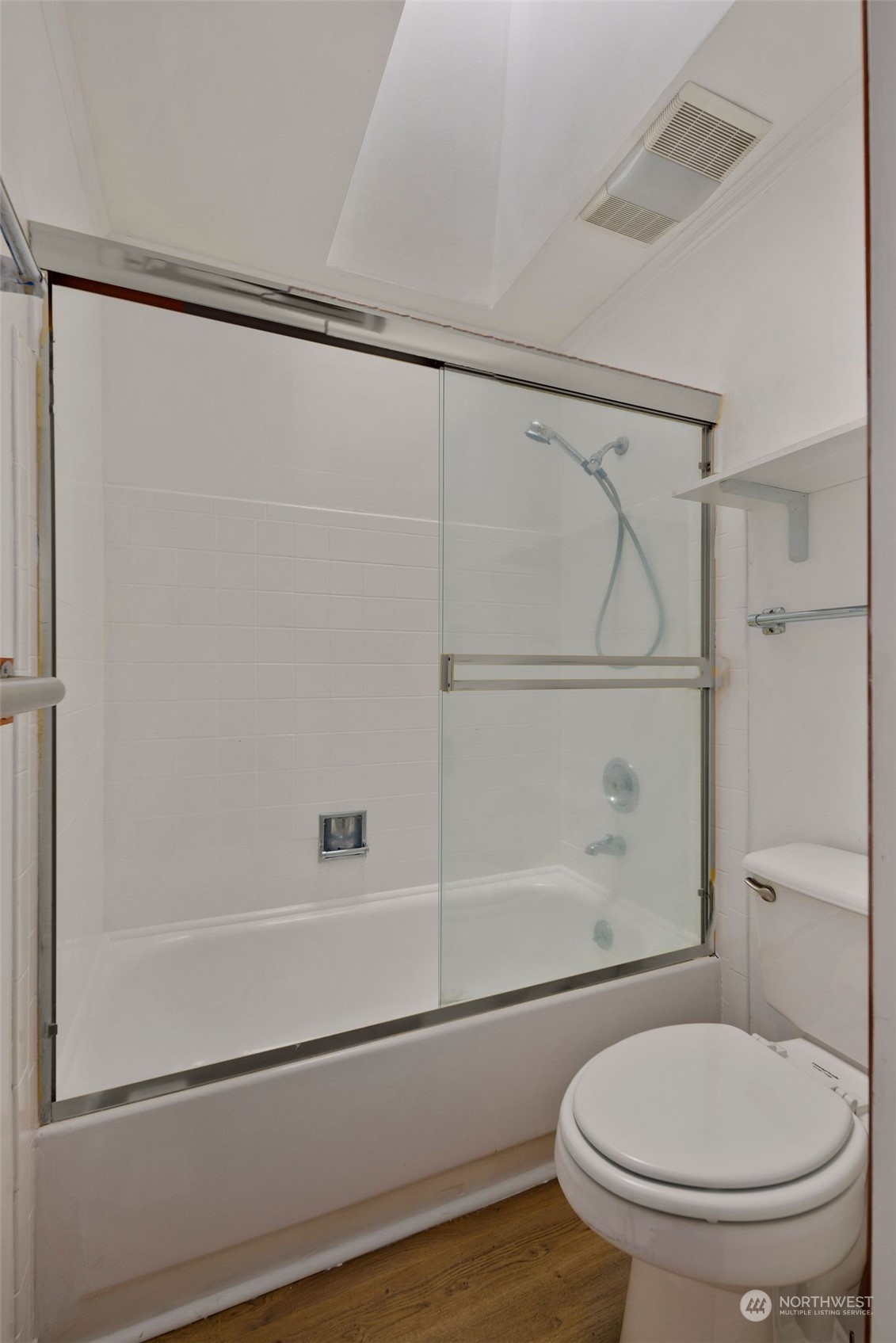 10705 Southeast 236th Place Kent, WA 98031 - Photo 19 of 36 a bathroom with a shower and a toilet