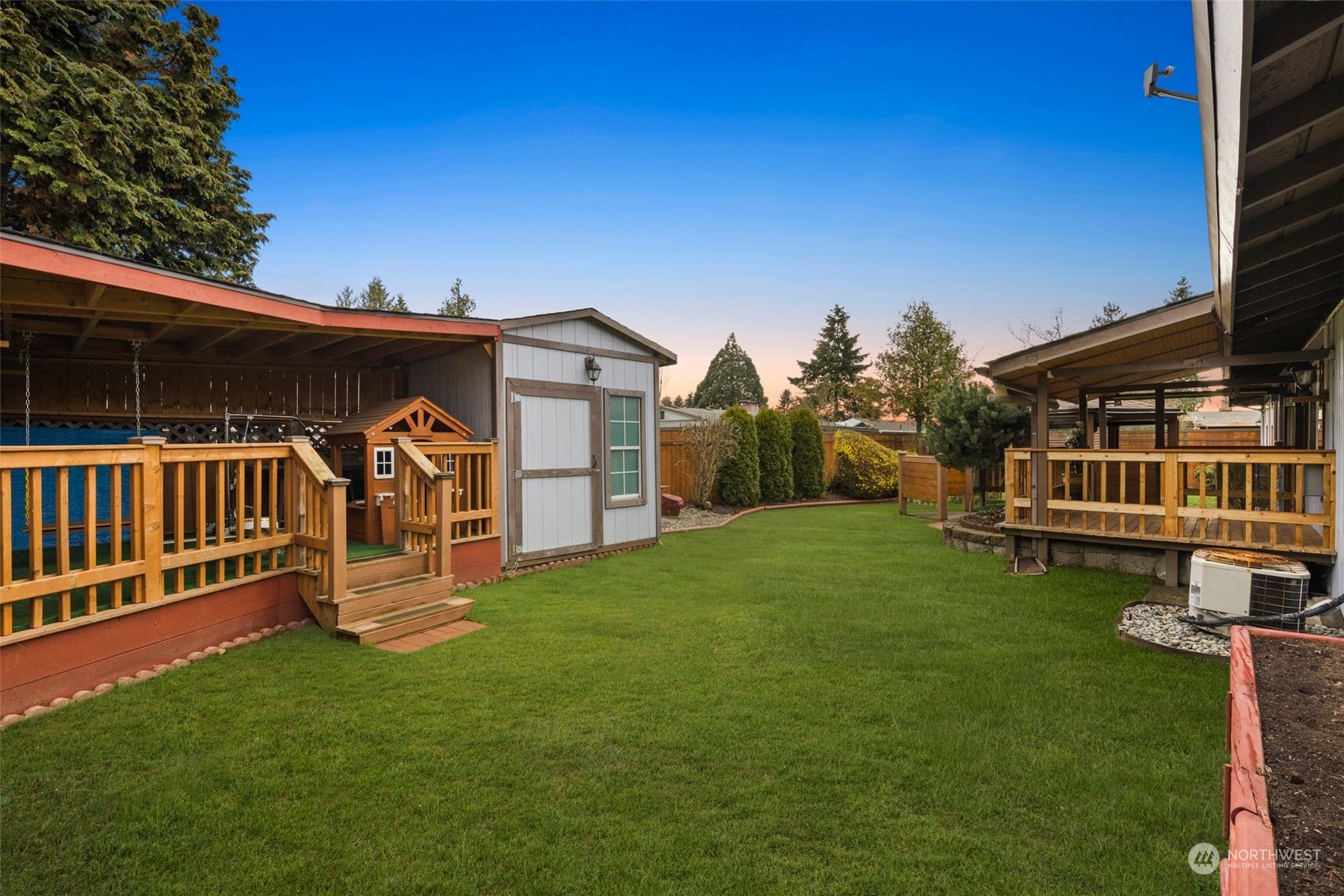 10705 Southeast 236th Place Kent, WA 98031 - Photo 29 of 36 a view of a house with backyard and porch