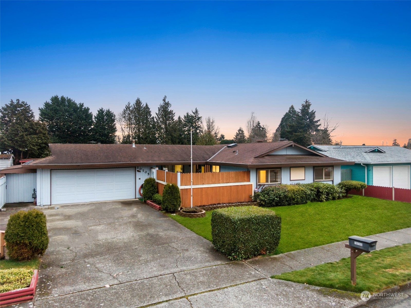 10705 Southeast 236th Place Kent, WA 98031 - Photo 3 of 36 a front view of a house with a yard