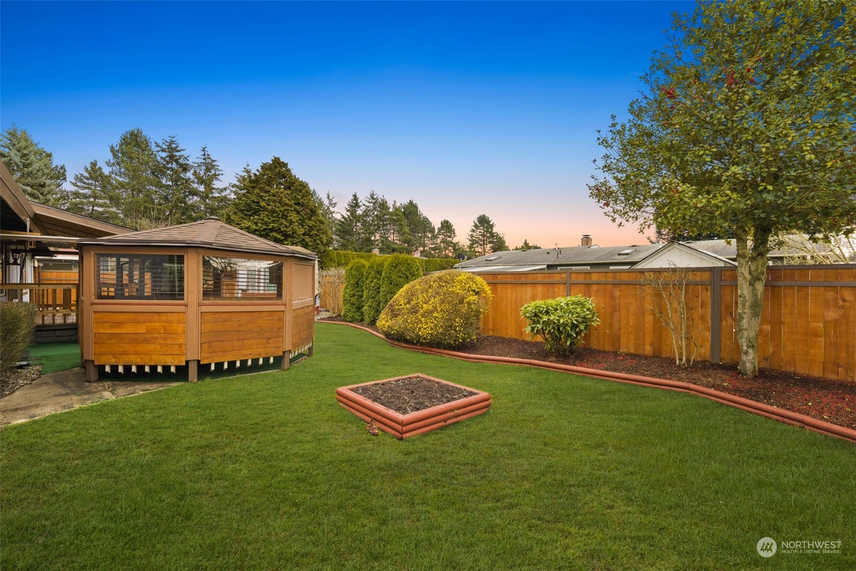 10705 Southeast 236th Place Kent, WA 98031 - Photo 31 of 36 a view of a house with a big yard
