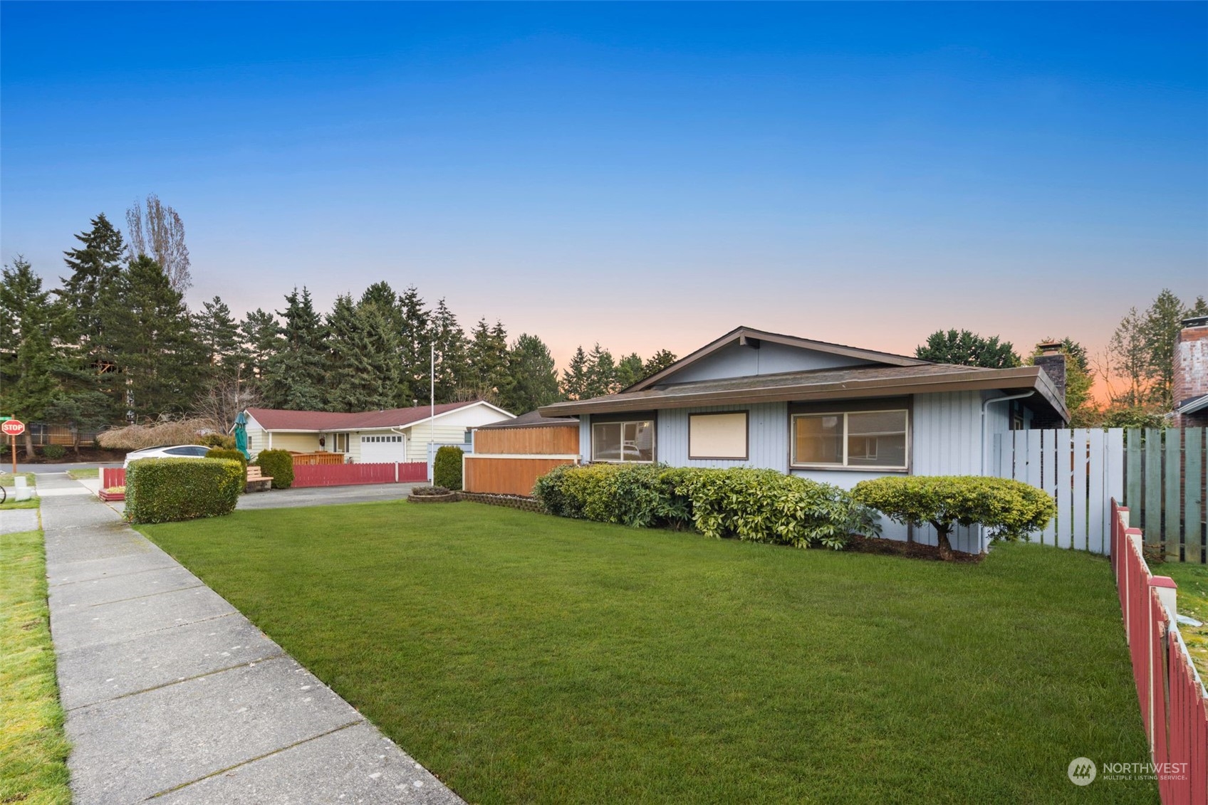 10705 Southeast 236th Place Kent, WA 98031 - Photo 4 of 36 a house view with a garden space