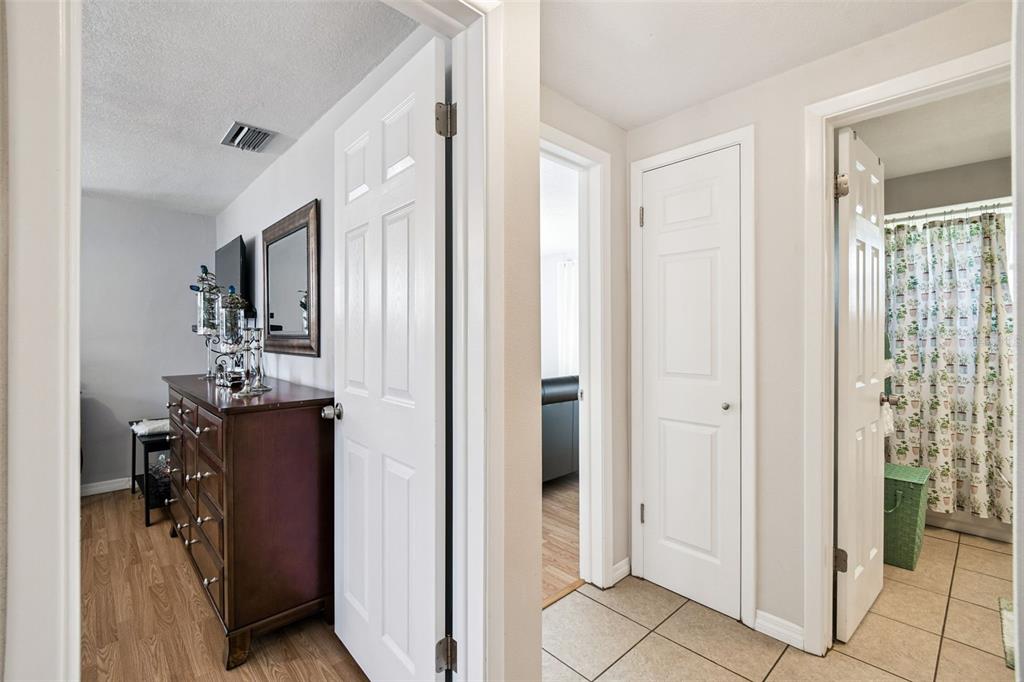 10801 Bethel Street Port Richey, FL 34668 - Photo 19 of 28 a view of a hallway with closet and a livingroom view