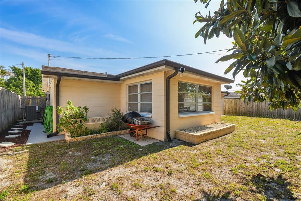 10801 Bethel Street Port Richey, FL 34668 - Photo 26 of 28 a front view of a house with garden