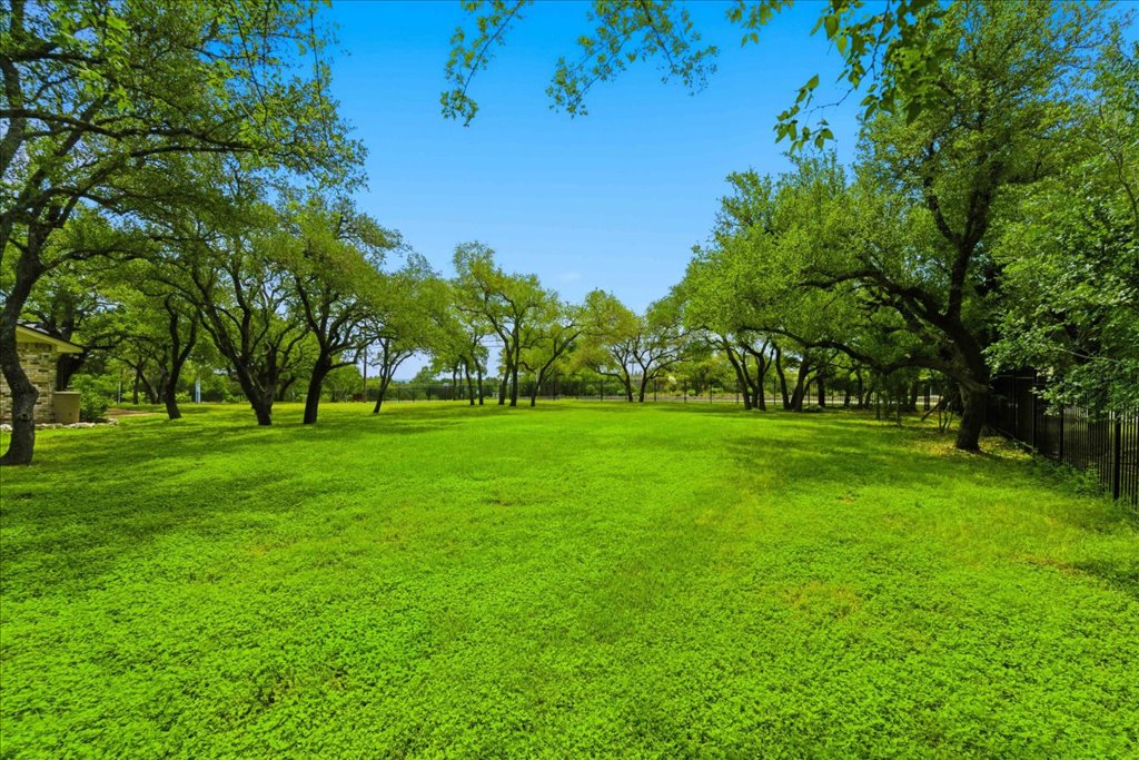 12702 Trails End Road Cedar Park, TX 78641 - Photo 29 of 40 Wide-open, flat 1-acre lot fully fenced- ideal for outdoor living, play, and enjoying the privacy and usability this property offers.