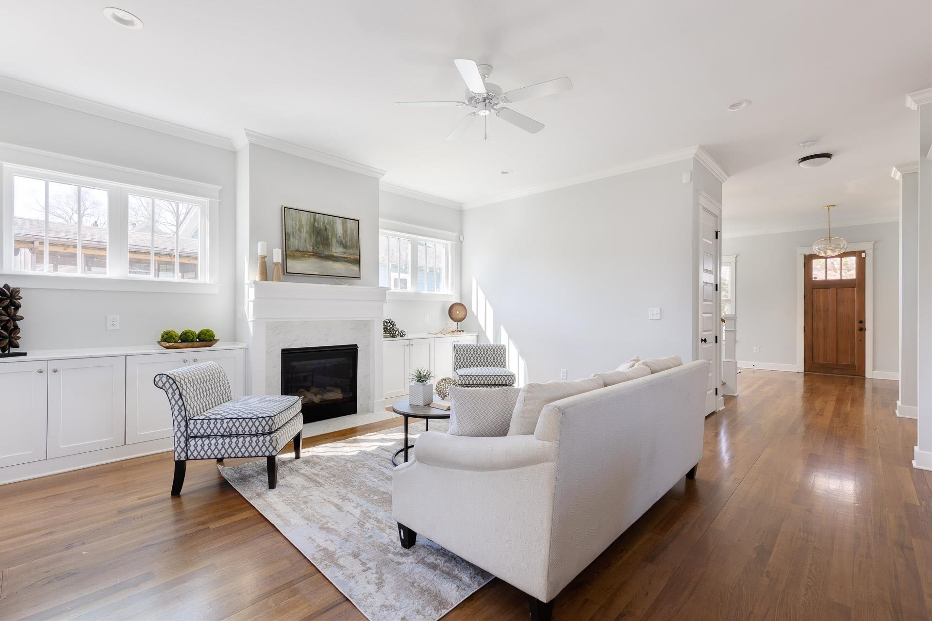 910 Sedgefield Street Durham, NC 27705 - Photo 13 of 39 a living room with furniture a fireplace and a flat screen tv